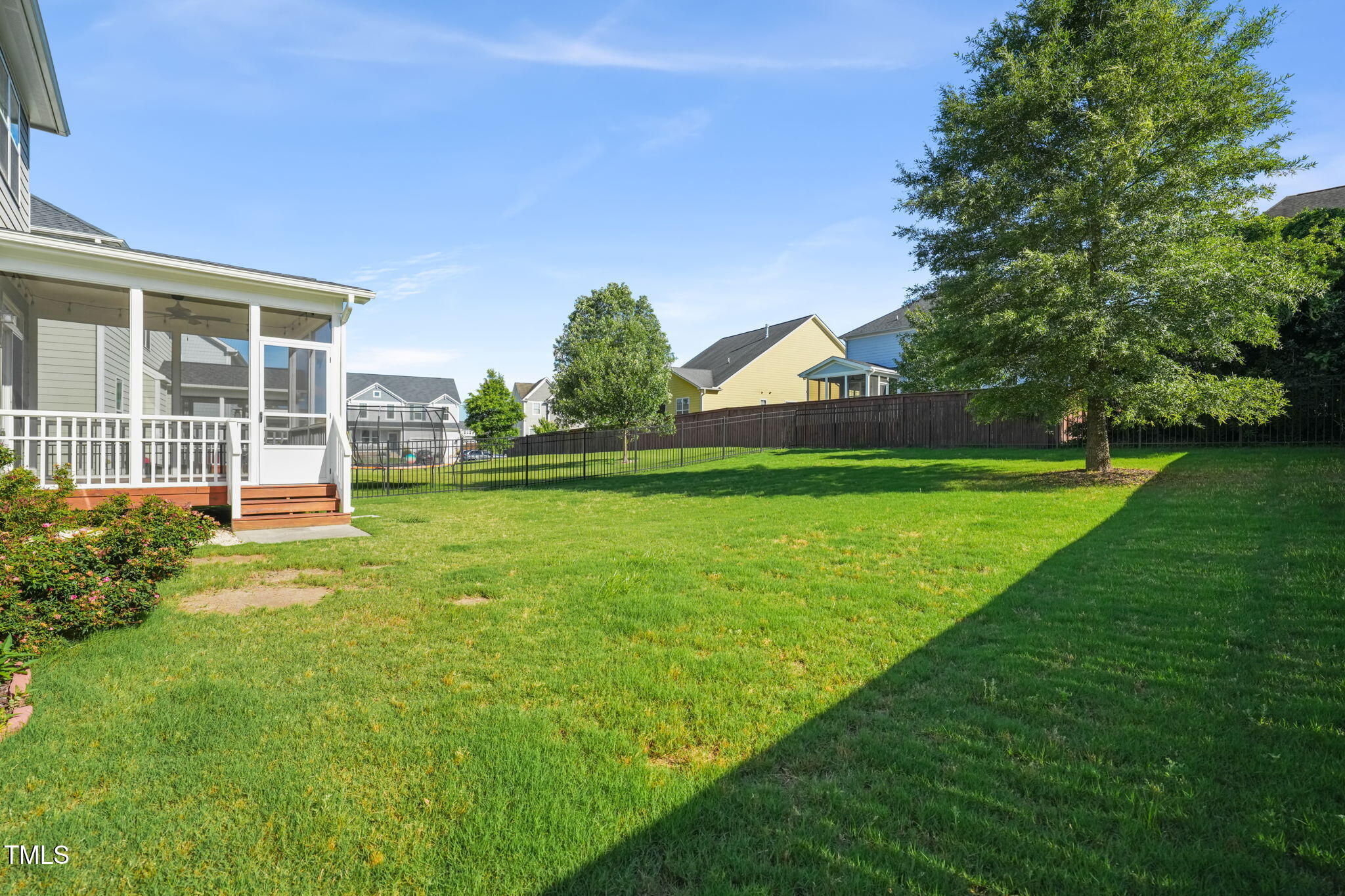 4508 Brintons Cottage Street Raleigh, NC 27616 - Photo 13 of 46 a view of a house with a yard and sitting area