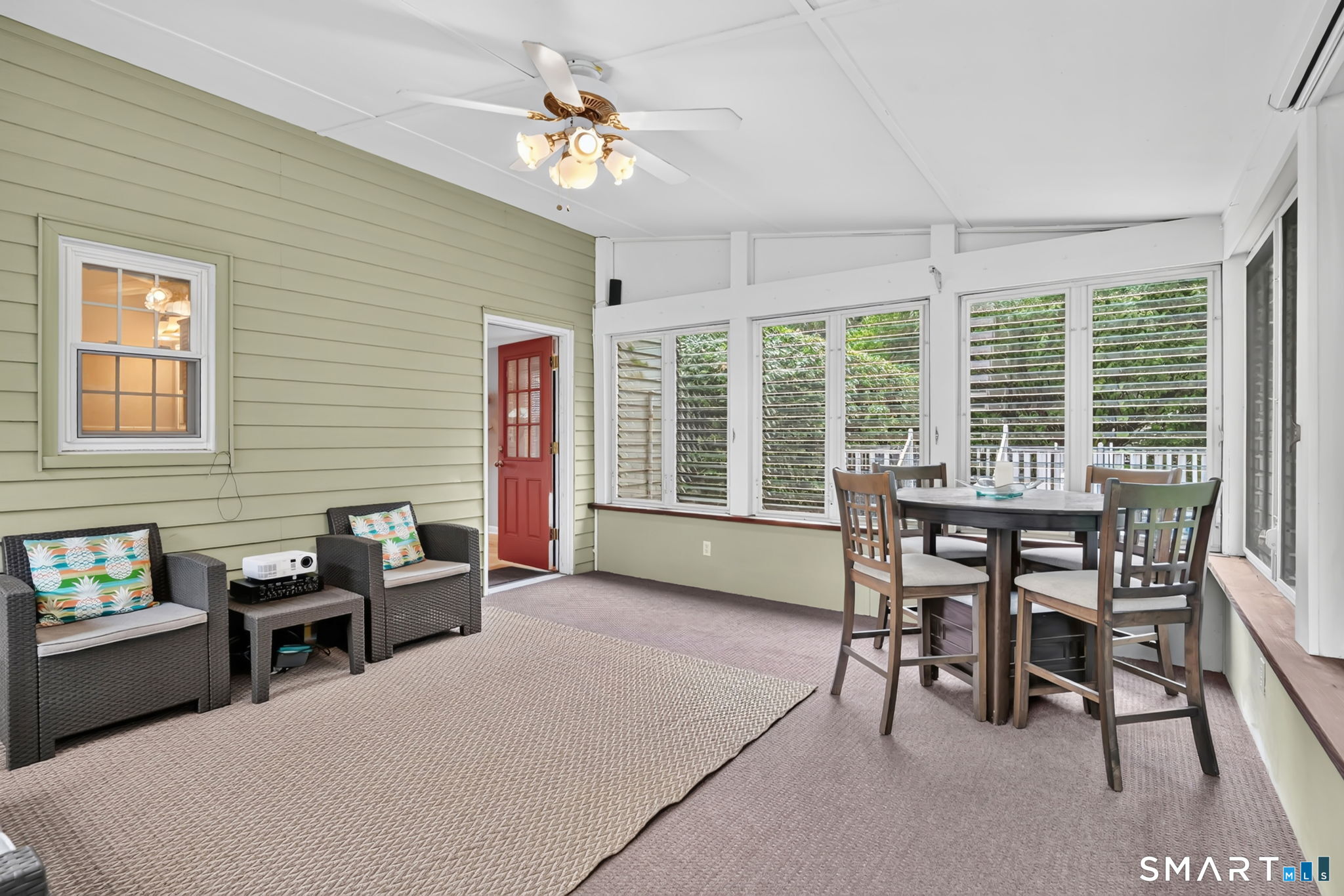 33 Brent Road Manchester, CT 06042 - Photo 25 of 38 Porch features fresh paint, new carpeting and plugs for speakers to create and customize your outdoor space.
