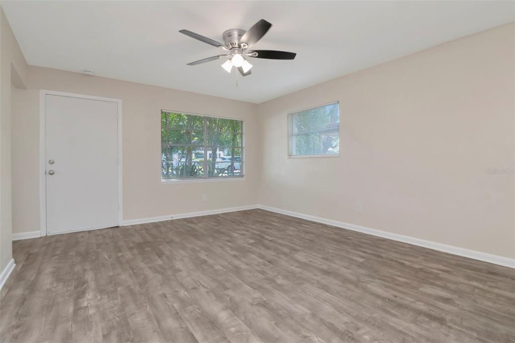 126 Kingsway Road Brandon, FL 33510 - Photo 15 of 42 a view of an empty room with a window