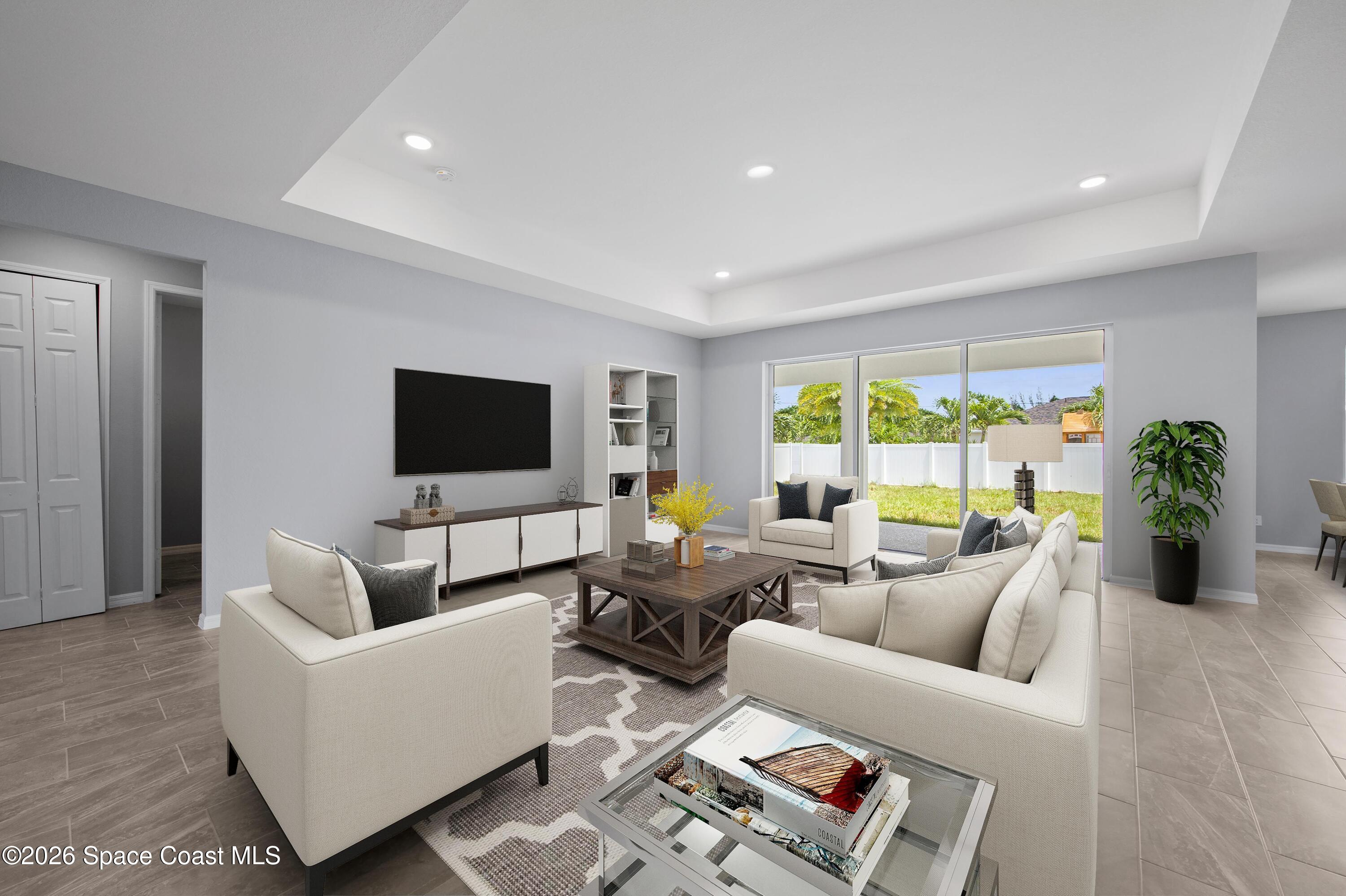 1327 Degroodt Road Southwest Palm Bay, FL 32908 - Photo 3 of 10 SL_GrandCayman_GreatRoom1