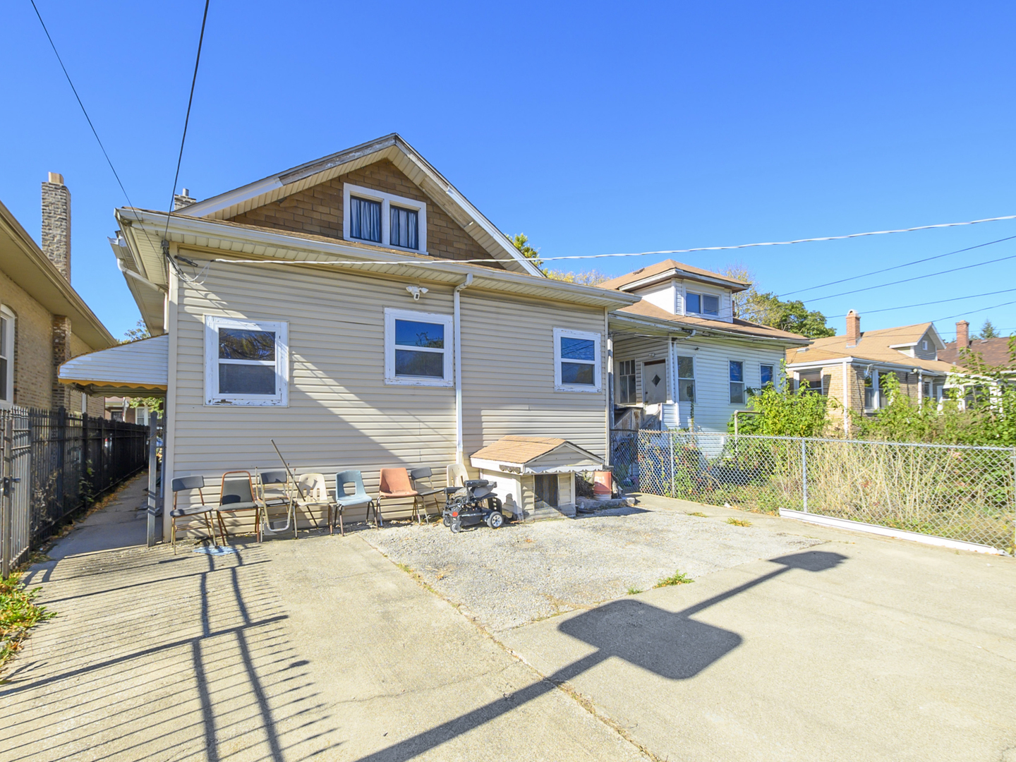 1413 North Long Avenue Chicago, IL 60651 - Photo 14 of 16 a front view of a house with a yard