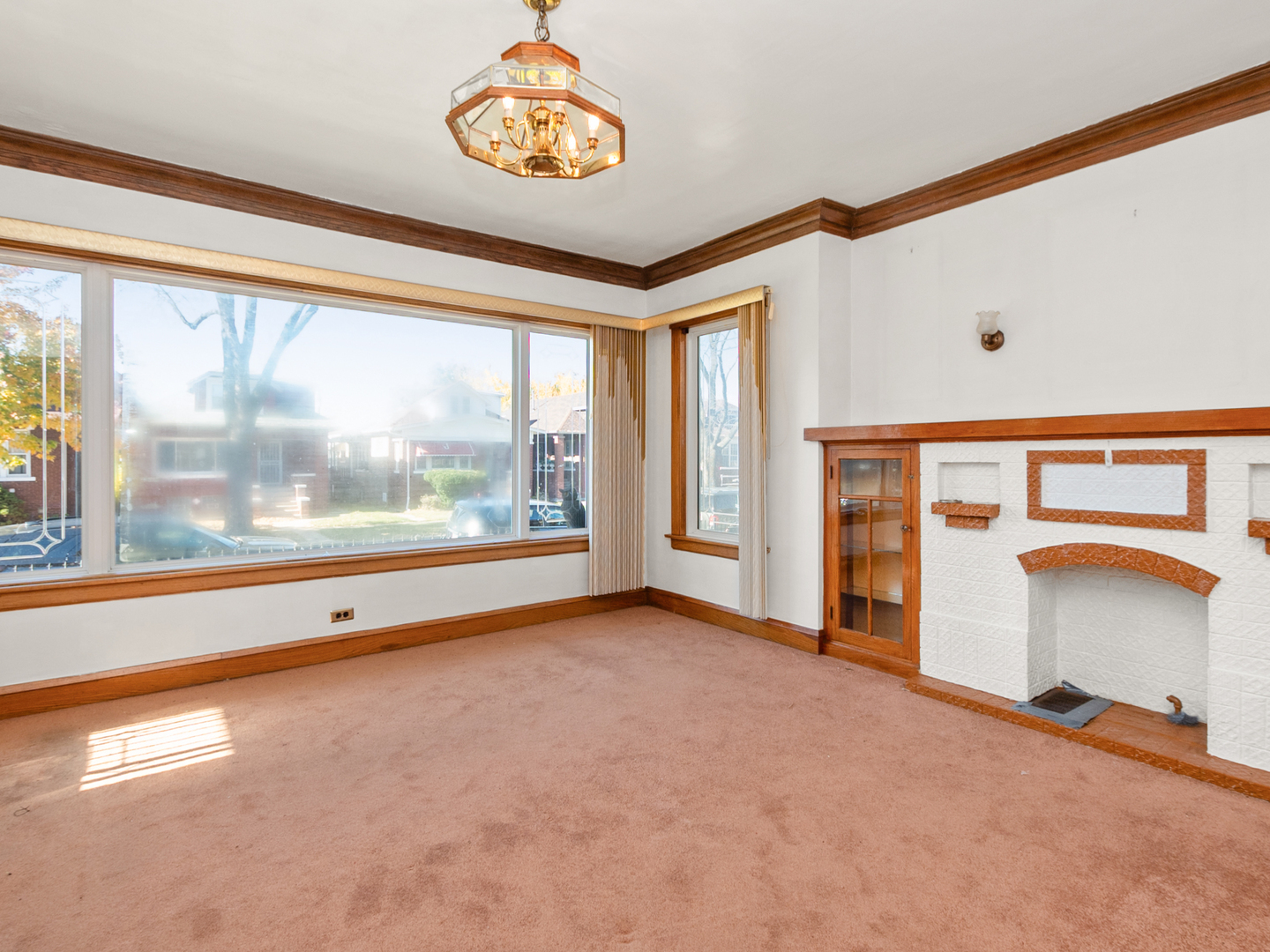 1413 North Long Avenue Chicago, IL 60651 - Photo 5 of 16 an empty room with a window