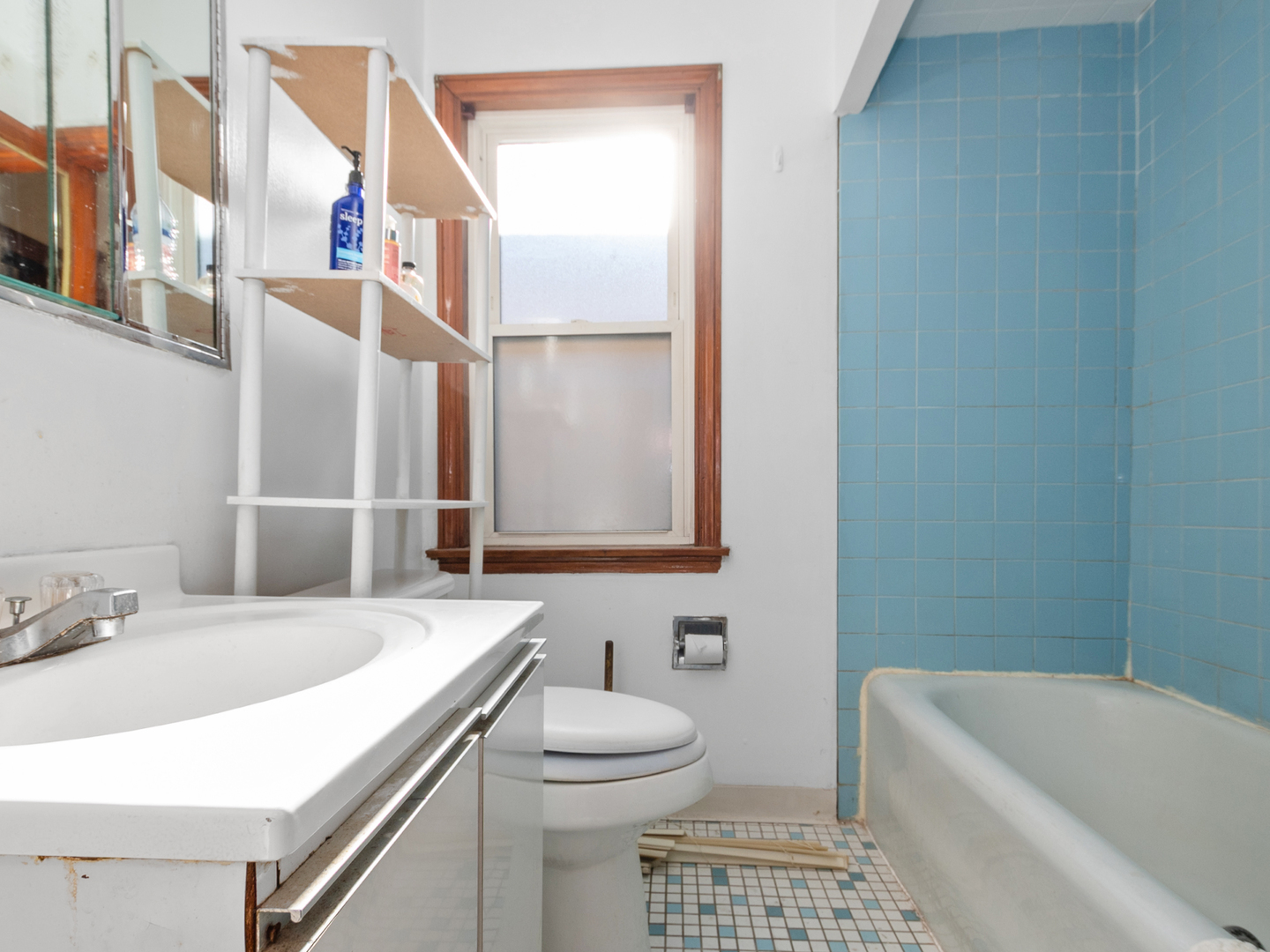 1413 North Long Avenue Chicago, IL 60651 - Photo 10 of 16 a bathroom with a sink a toilet and shower