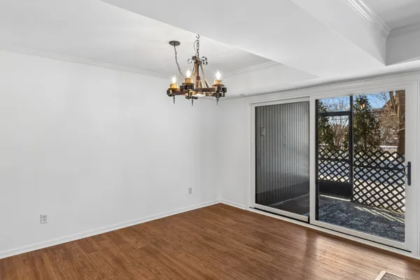 a view of a livingroom with wooden floor