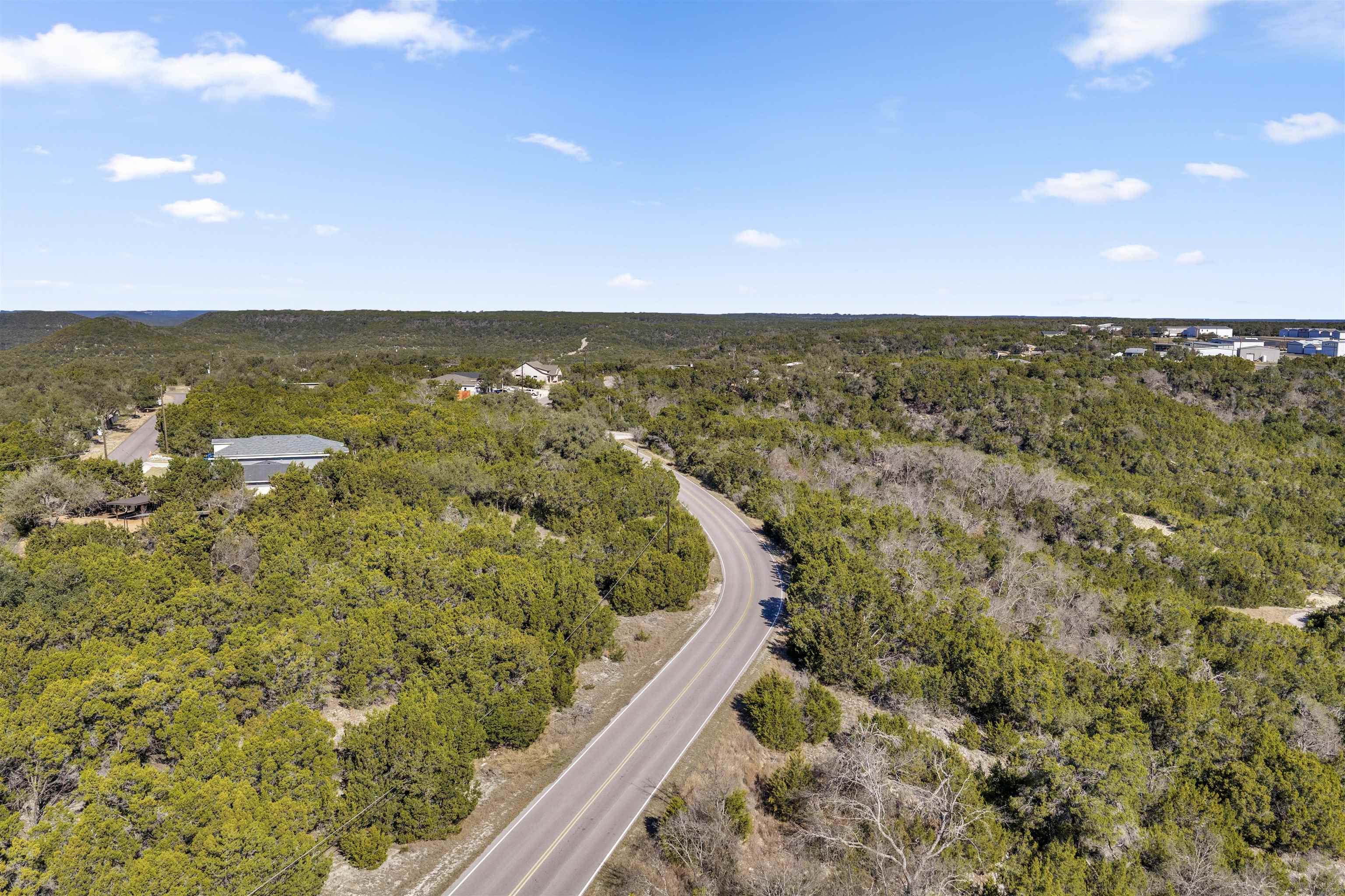 8614 Bar K Ranch Road Lago Vista, TX 78645 - Photo 14 of 26 a view of ocean with a city