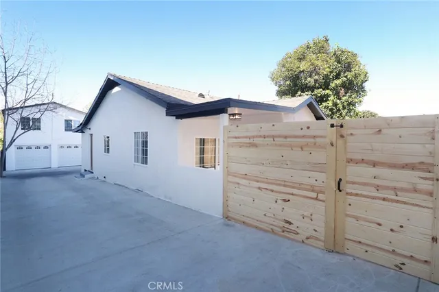 a bedroom with a bed and a book shelf
