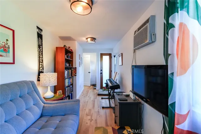 a view of a yard with wooden fence