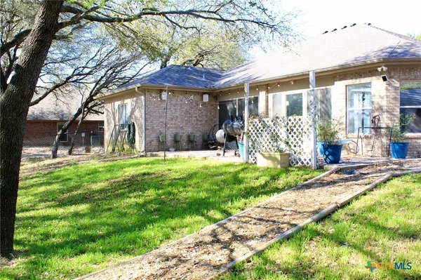a view of backyard of house
