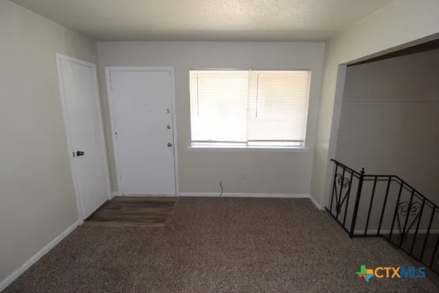 an empty room with a window