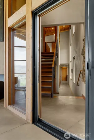 a view of a hallway view with staircase