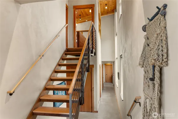 a view of entryway with wooden floor