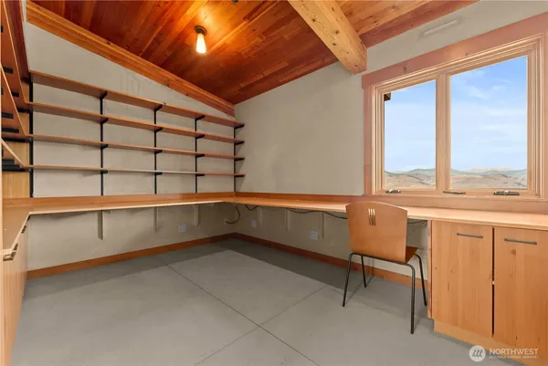 a view of a room with racks on the wall