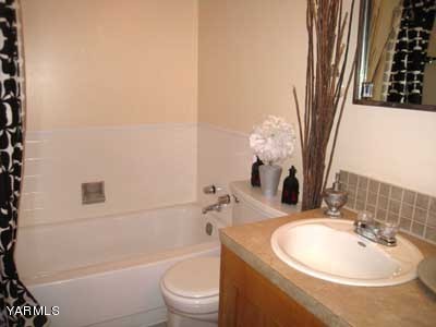 17161 Summitview Road Cowiche, WA 98923 - Photo 13 of 28 a bathroom with a sink a toilet and shower