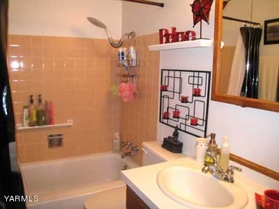 17161 Summitview Road Cowiche, WA 98923 - Photo 6 of 28 a bathroom with a sink and a mirror