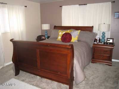 17161 Summitview Road Cowiche, WA 98923 - Photo 7 of 28 a bed sitting in a room next to a window