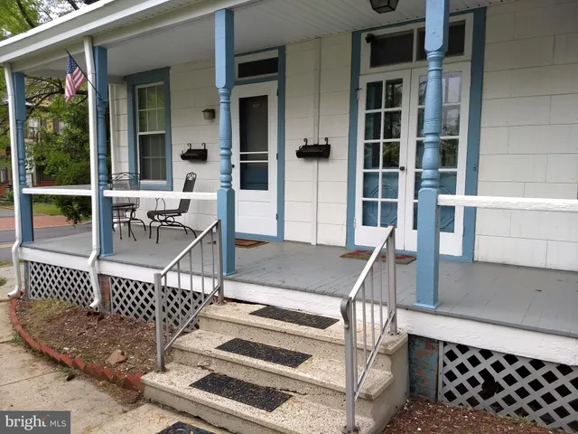 front view of a house with a balcony
