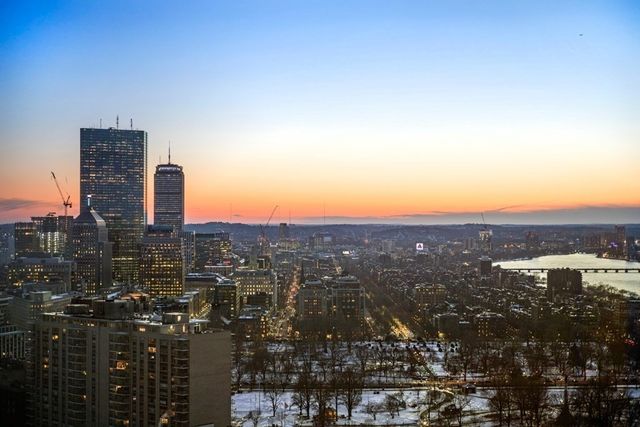 a view of a city with tall buildings