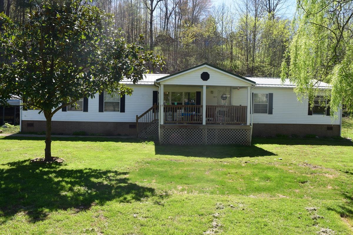105 Carolina Road Rocky Mount, VA 24151 - Photo 3 of 32 a front view of a house with a yard