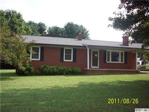143 Barry Oak Road Statesville, NC 28625 - Photo 1 of 8 a view of a house with a garden