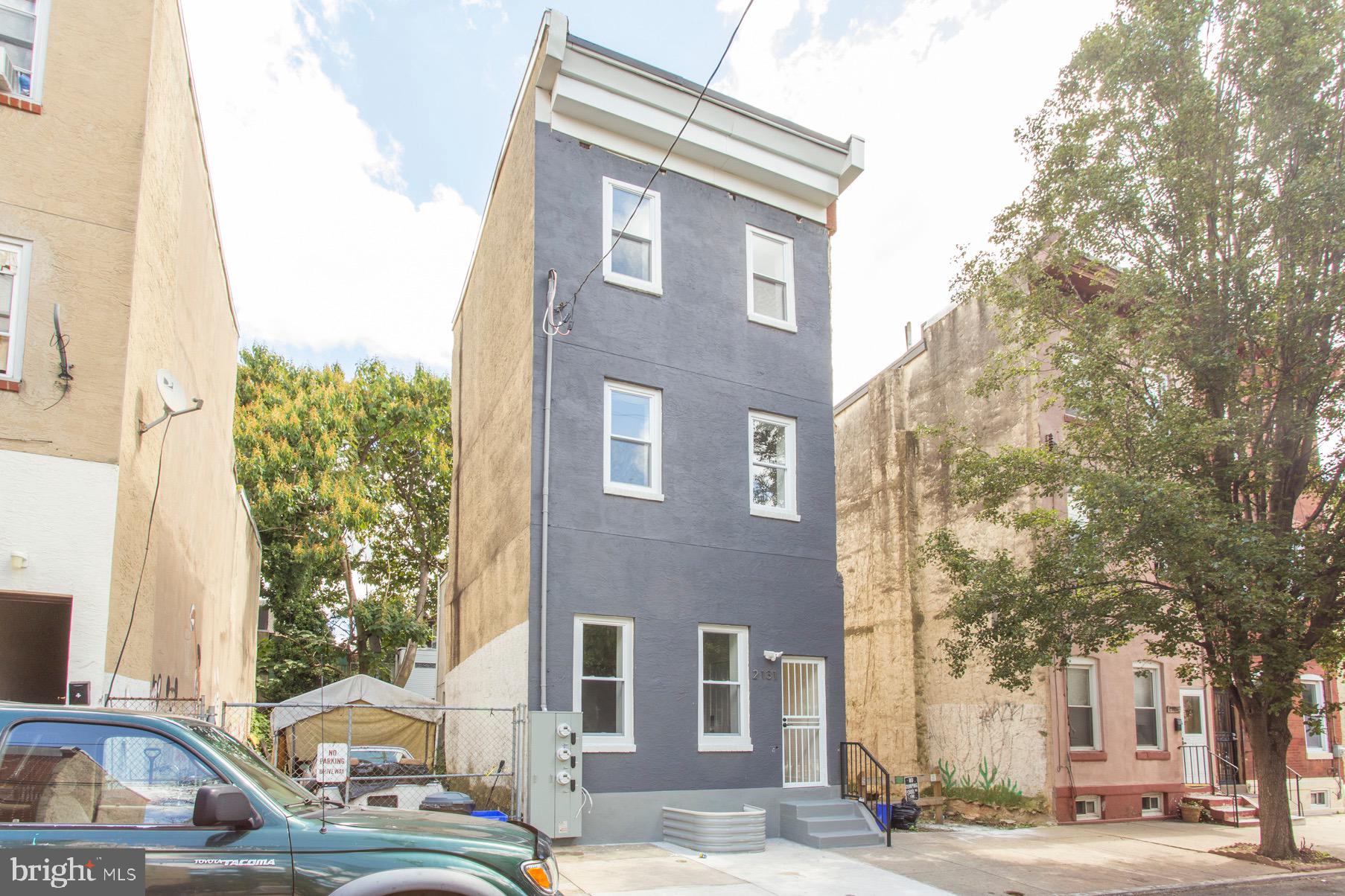 2131 North 8th Street, Unit 2 Philadelphia, PA 19122 - Photo 18 of 19 a front view of a building with street view
