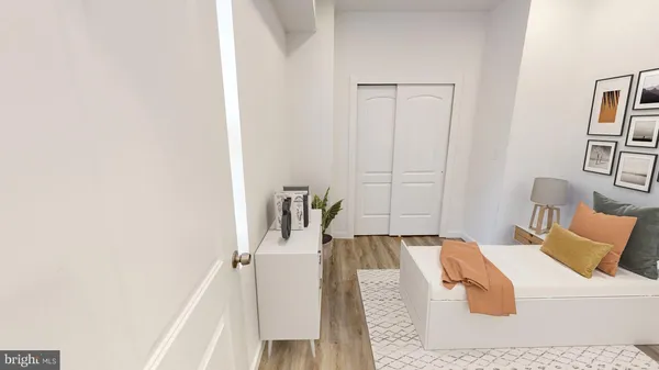a bed room with a bed and a couch