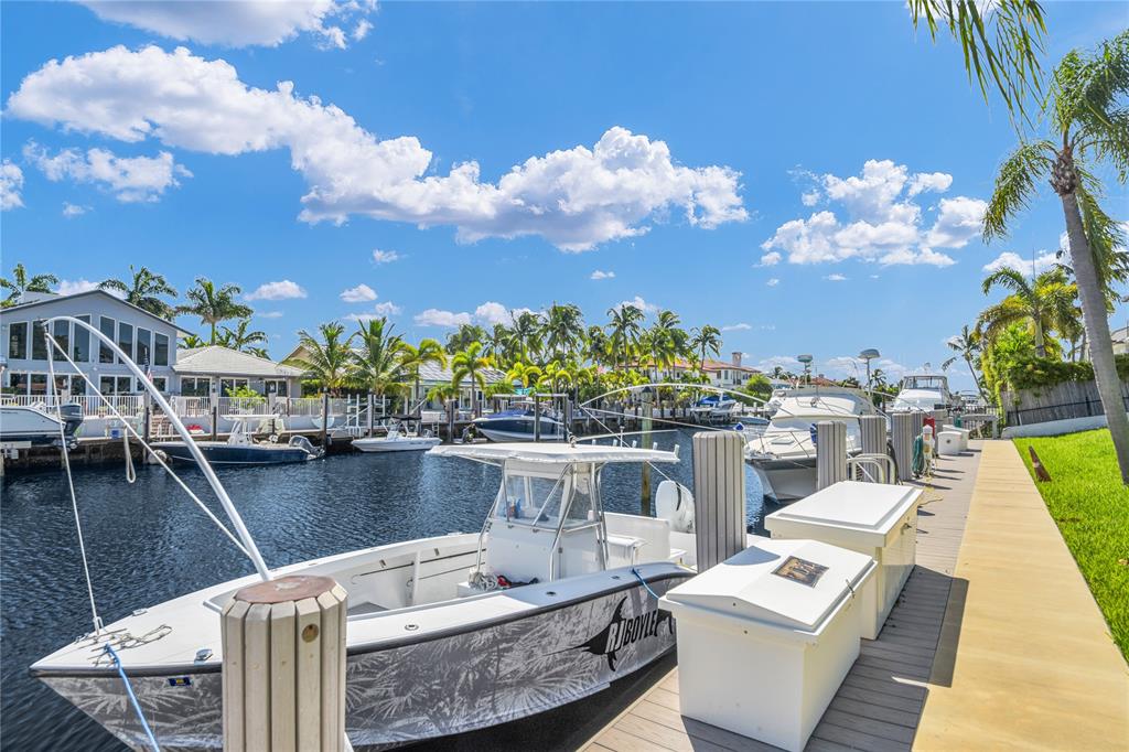 a view of house with outdoor space and seating
