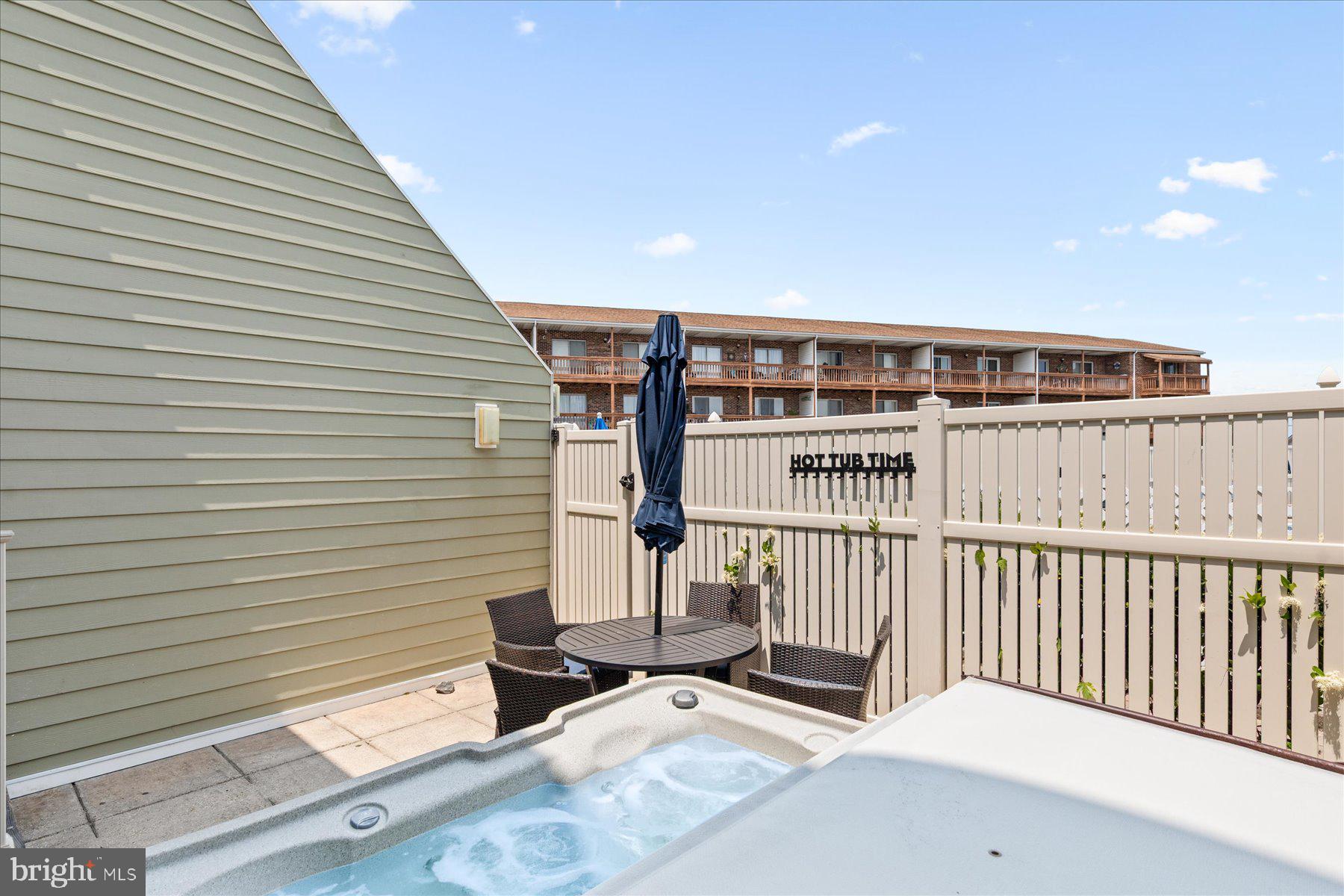 14409 Lighthouse Avenue, Unit 2 Ocean City, MD 21842 - Photo 36 of 39 a view of a balcony with chairs