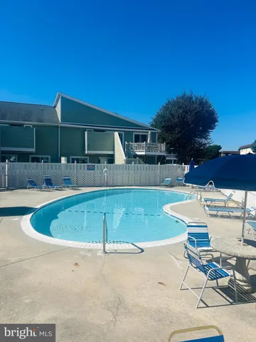 a view of a backyard with a patio
