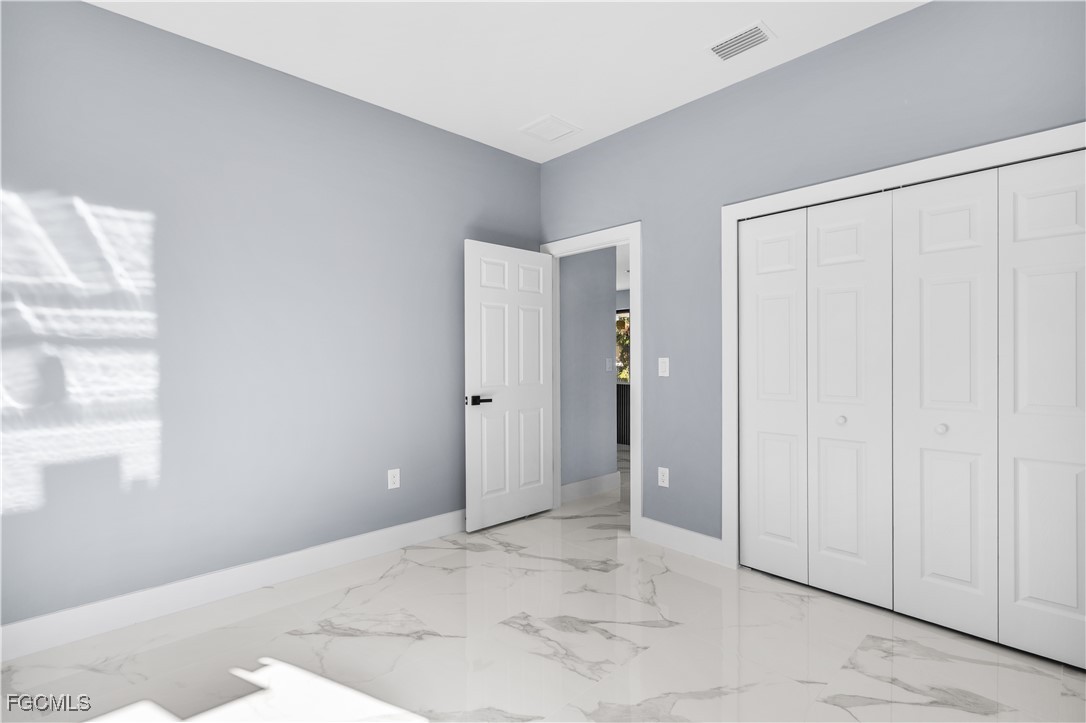 714 Hamilton Avenue Lehigh Acres, FL 33972 - Photo 14 of 30 a view of an empty room