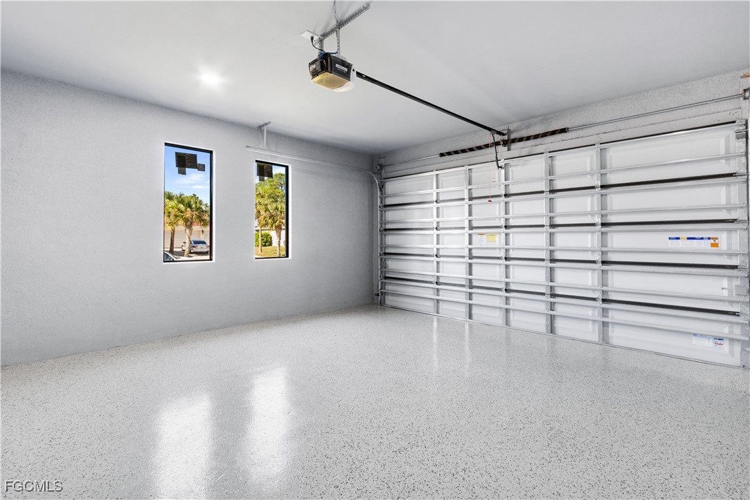 714 Hamilton Avenue Lehigh Acres, FL 33972 - Photo 28 of 30 a view of a garage