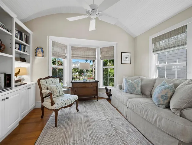 a kitchen with a sink appliances and cabinets