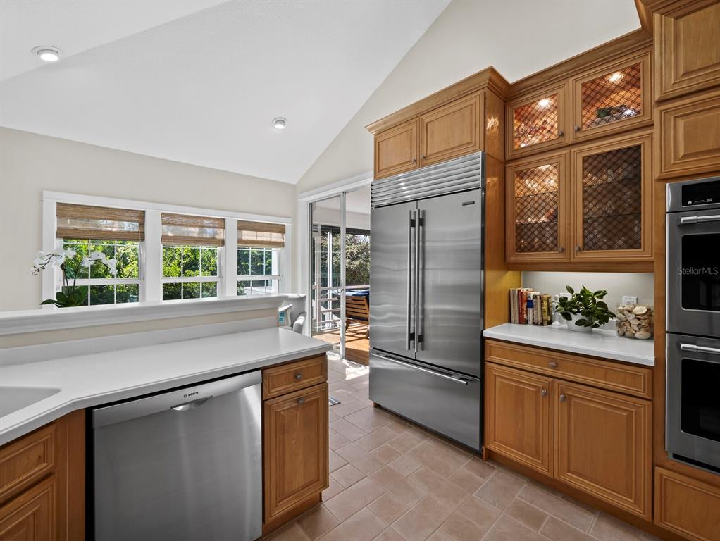 160 Blackwall Court Boca Grande, FL 33921 - Photo 14 of 56 a kitchen with a refrigerator and a sink
