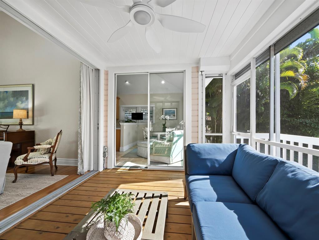 160 Blackwall Court Boca Grande, FL 33921 - Photo 19 of 56 a living room with furniture and a large window