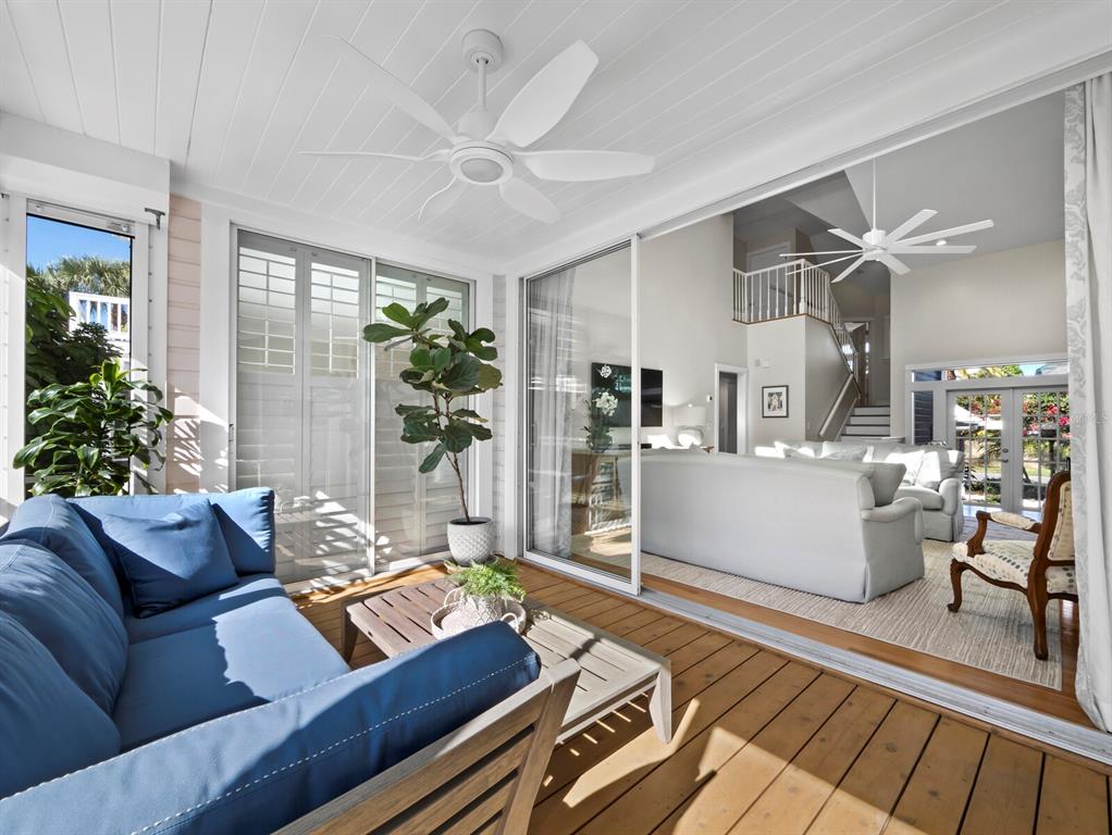 160 Blackwall Court Boca Grande, FL 33921 - Photo 20 of 56 a living room with furniture and a large window