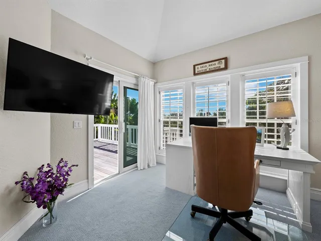 a spacious bathroom with bathtub and shower