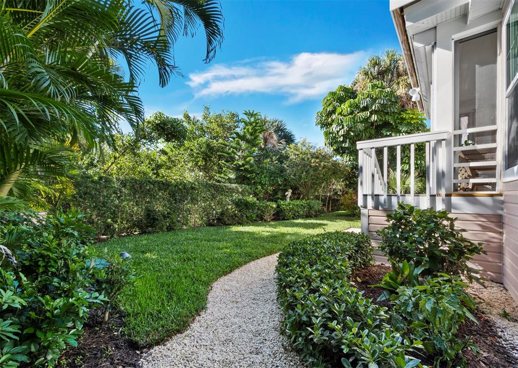160 Blackwall Court Boca Grande, FL 33921 - Photo 39 of 56 a view of a house with a yard and potted plants