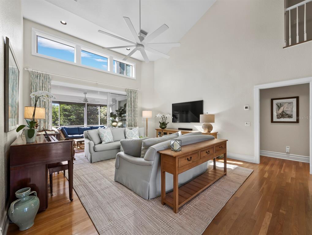 160 Blackwall Court Boca Grande, FL 33921 - Photo 7 of 56 a living room with furniture and a flat screen tv