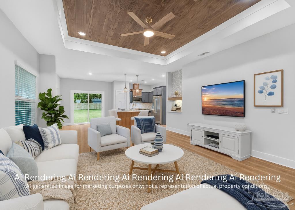 6115 Carroll Road Milton, FL 32583 - Photo 2 of 57 a living room with furniture and a flat screen tv