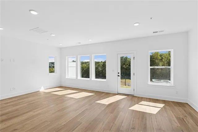 an empty room with windows