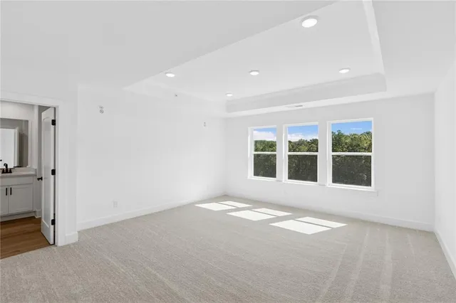a bathroom with a double vanity sink mirror and shower