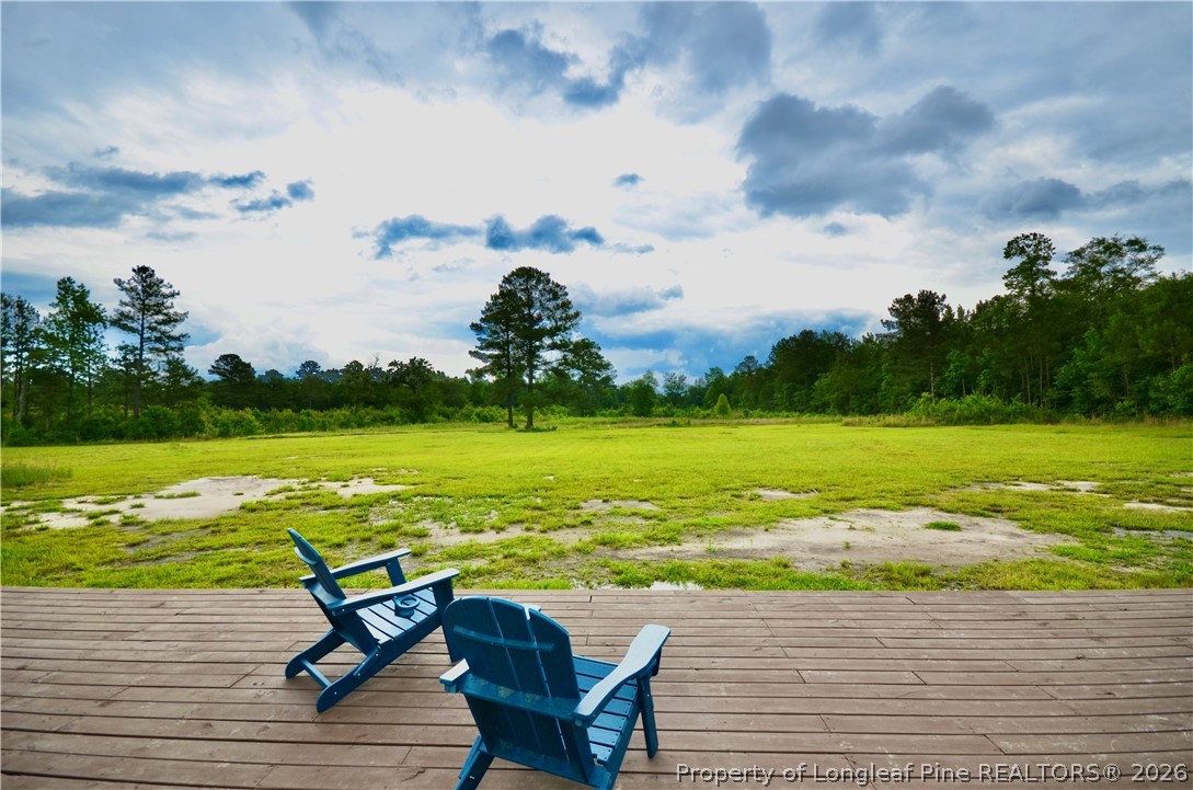 1865 John B Carter Road Fayetteville, NC 28312 - Photo 35 of 49 a view of a lake with table and chairs