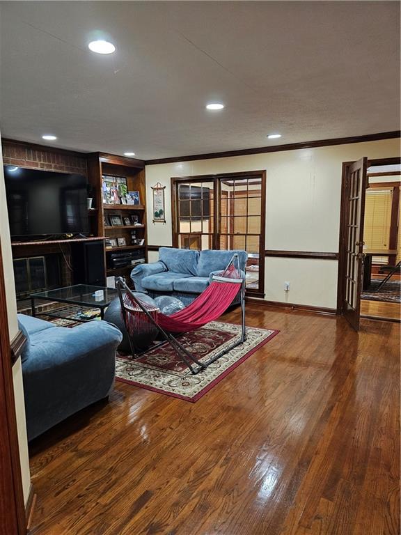 1935 Coventry Way Jonesboro, GA 30236 - Photo 19 of 33 a living room with furniture and a flat screen tv
