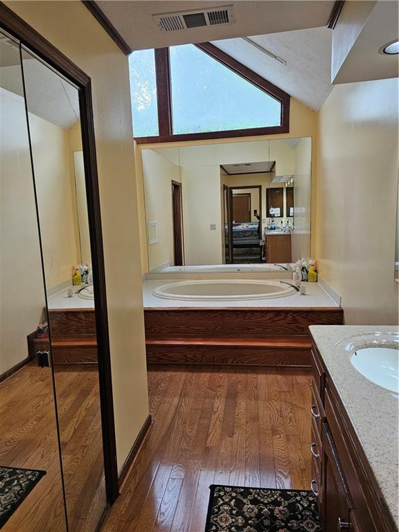 1935 Coventry Way Jonesboro, GA 30236 - Photo 23 of 33 a bathroom with a sink and a mirror