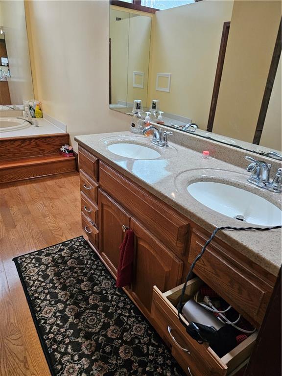 1935 Coventry Way Jonesboro, GA 30236 - Photo 27 of 33 a bathroom with a sink and a mirror
