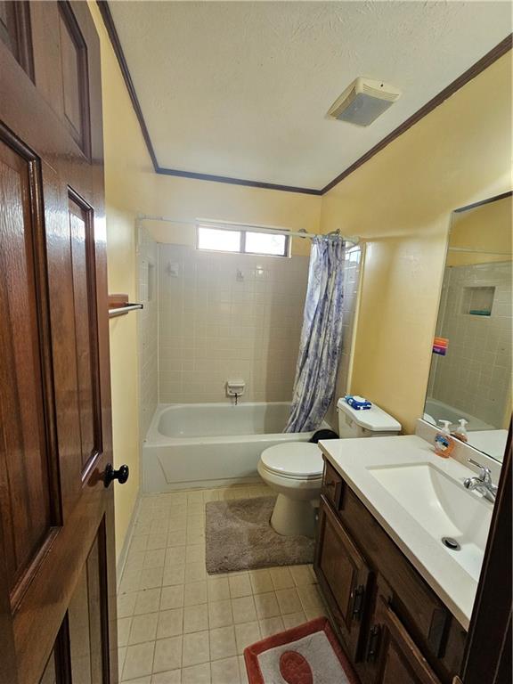 1935 Coventry Way Jonesboro, GA 30236 - Photo 33 of 33 a bathroom with a sink a toilet a mirror and shower