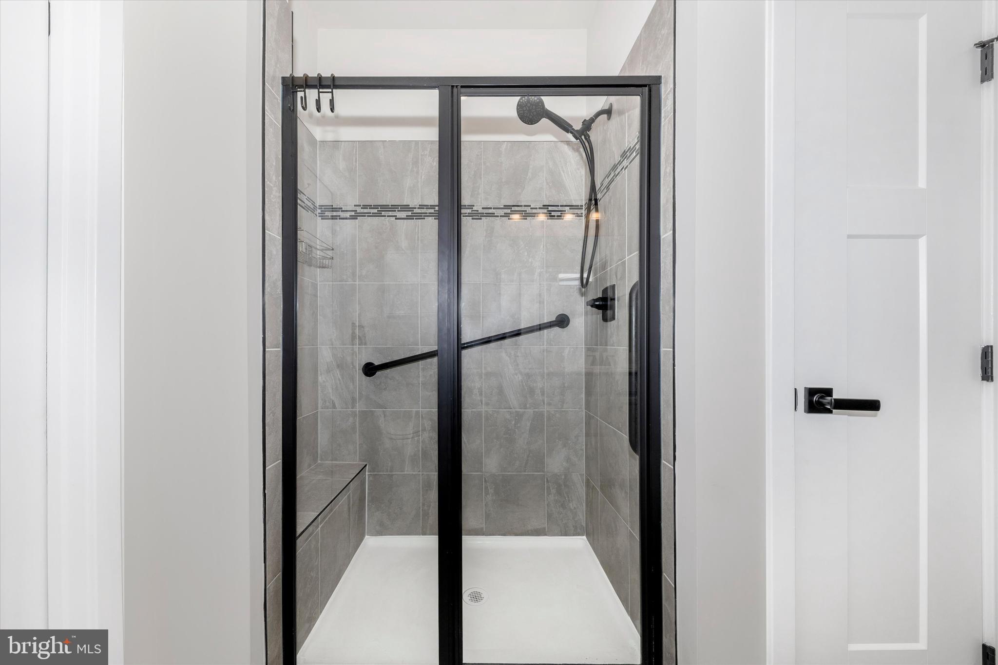 6028 Calla Place Frederick, MD 21703 - Photo 22 of 46 Shower with tile surround