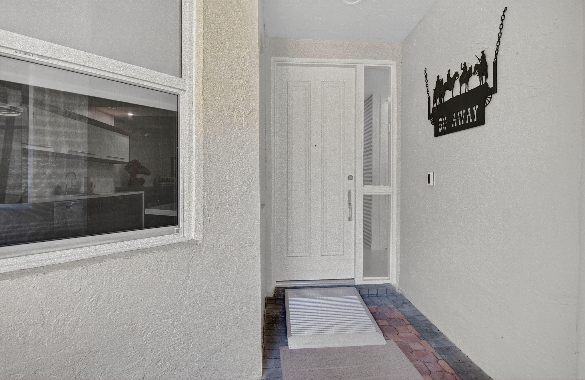 2584 Coco Plum Boulevard, Unit 104 Boca Raton, FL 33496 - Photo 3 of 51 3-web-or-mls-DSC_2190