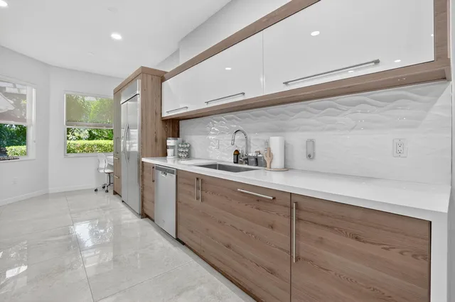 $989,000 | 2584 Coco Plum Boulevard, Unit 104, Boca Raton, FL 33496