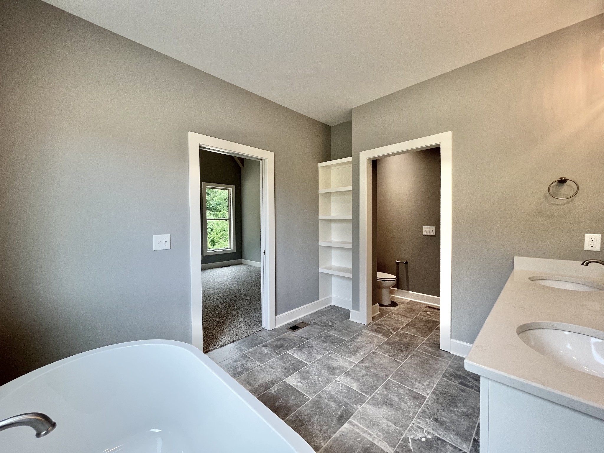 808 Ridgestone Place, Unit 105C Lebanon, TN 37087 - Photo 20 of 25 a bathroom with a sink and mirror
