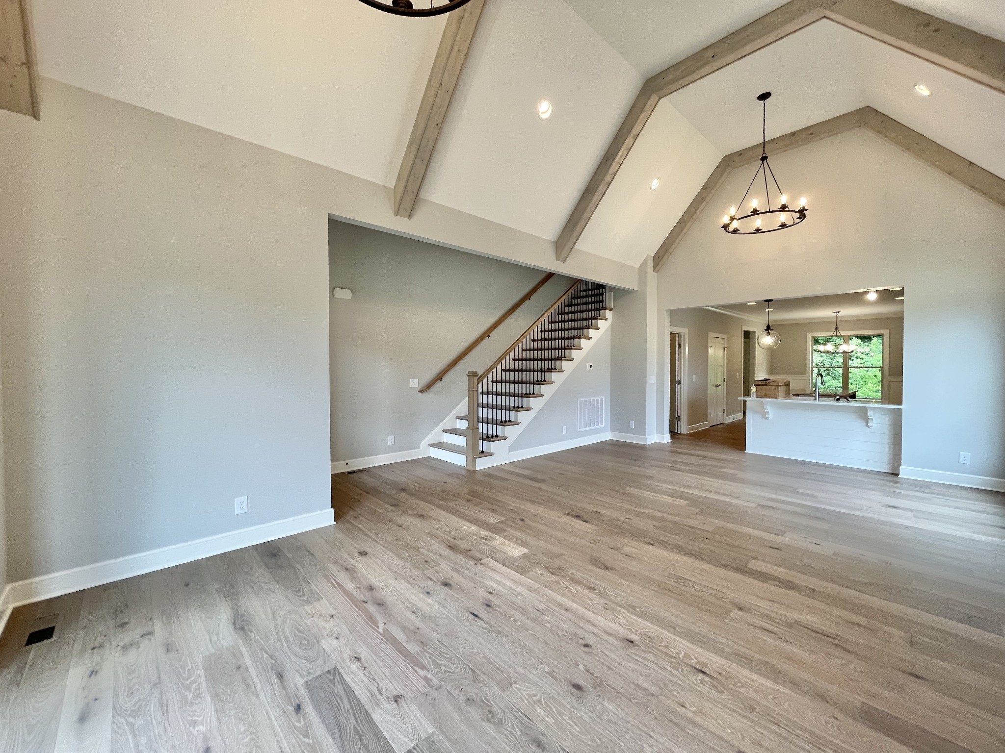 808 Ridgestone Place, Unit 105C Lebanon, TN 37087 - Photo 3 of 25 wooden floor in an empty room with a window